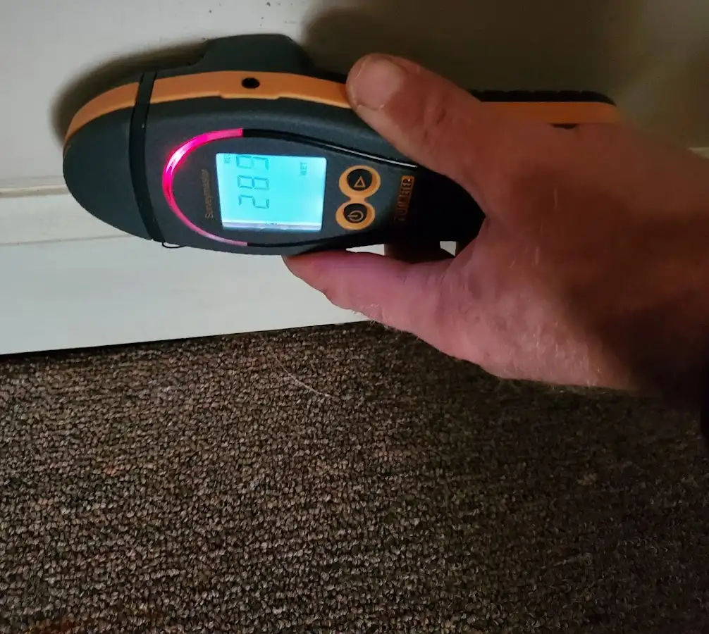 Moisture detection at baseboard during Burst Pipe Cleanup in Hawaiian Gardens